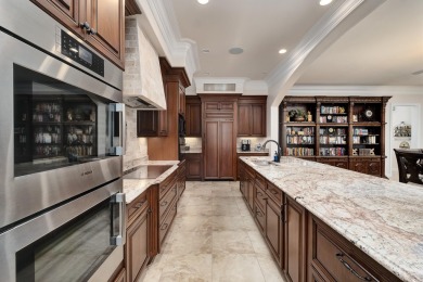 Located in the highly sought-after, privately gated community of