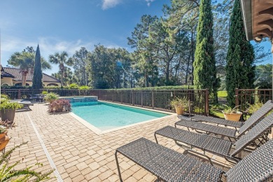 Located in the highly sought-after, privately gated community of