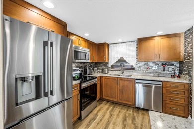 This wonderful waterfront condo is a few mere steps to Boca