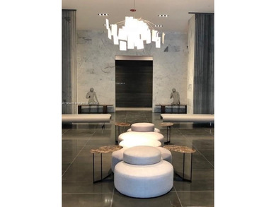 Experience the pinnacle of Downtown Miami living! This spacious