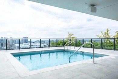 Experience the pinnacle of Downtown Miami living! This spacious