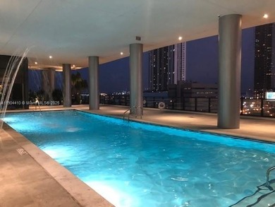 Experience the pinnacle of Downtown Miami living! This spacious