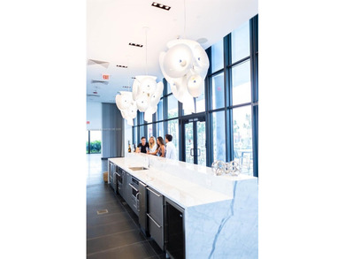 Experience the pinnacle of Downtown Miami living! This spacious