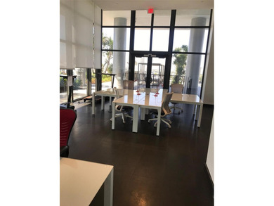 Experience the pinnacle of Downtown Miami living! This spacious