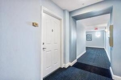 Welcome to this pristine top floor, corner unit with SE