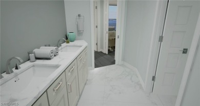 This new construction waterfront condo features a stunning view