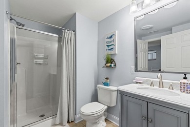 Discover the ultimate coastal living in Unit 1N at The Club at