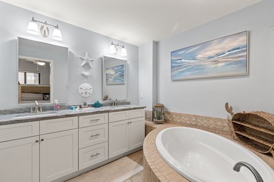 Discover the ultimate coastal living in Unit 1N at The Club at