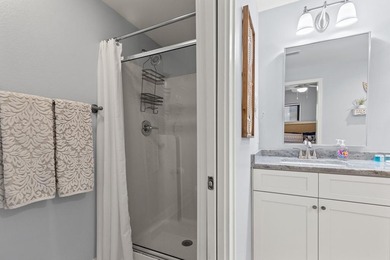 Discover the ultimate coastal living in Unit 1N at The Club at