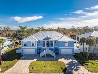 Completed in 2021, this CUSTOM-DESIGNED WATERFRONT RETREAT