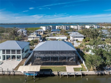 Completed in 2021, this CUSTOM-DESIGNED WATERFRONT RETREAT