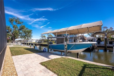 Completed in 2021, this CUSTOM-DESIGNED WATERFRONT RETREAT