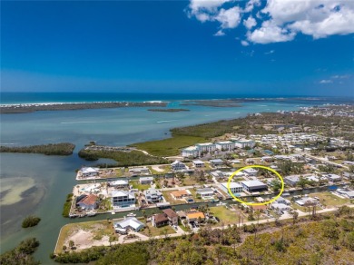 Completed in 2021, this CUSTOM-DESIGNED WATERFRONT RETREAT