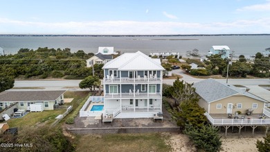 Income producing property! This is the epitome of coastal living