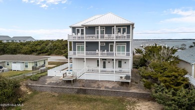 Income producing property! This is the epitome of coastal living