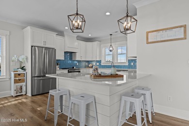 Income producing property! This is the epitome of coastal living