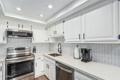 1 Bedroom + Den Condo in a Resort-Style Gated Community! This