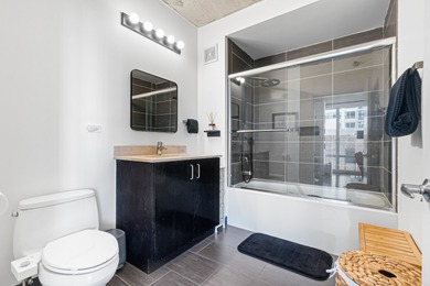 This bright and modern corner one bedroom unit at The Vetro