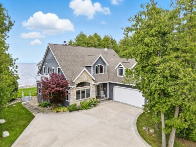 Welcome to your waterfront retreat!  This stunning five-bedroom