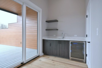 Elevated Luxury at its finest in downtown Elmhurst.  These grand