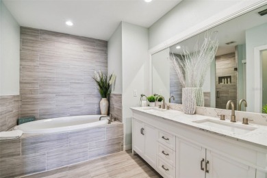 Tropical coastal living at its finest in Clearwater Beach. Step