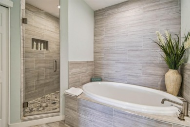 Tropical coastal living at its finest in Clearwater Beach. Step