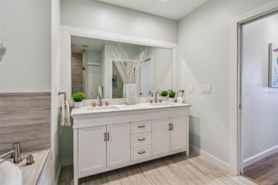 Tropical coastal living at its finest in Clearwater Beach. Step