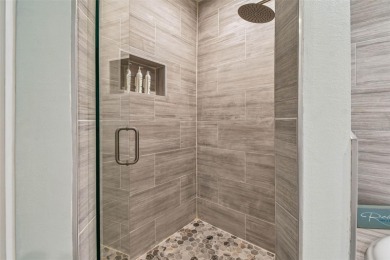 Tropical coastal living at its finest in Clearwater Beach. Step