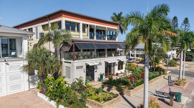 Discover a one-of-a-kind modular home steps from
Boca Ciega bay