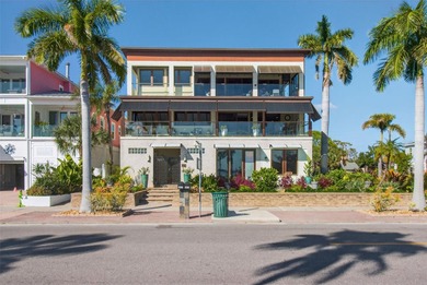 Discover a one-of-a-kind modular home steps from
Boca Ciega bay