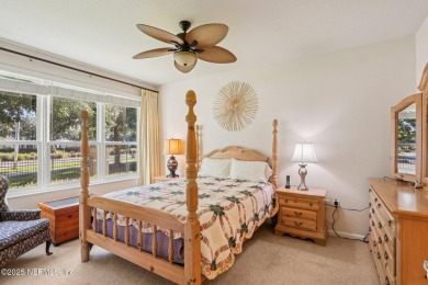 Welcome to this charming ground-level, end unit condo in the