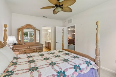 Welcome to this charming ground-level, end unit condo in the