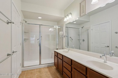 Welcome to this charming ground-level, end unit condo in the