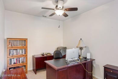 Welcome to this charming ground-level, end unit condo in the