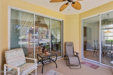 Welcome to this charming ground-level, end unit condo in the