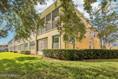 Welcome to this charming ground-level, end unit condo in the