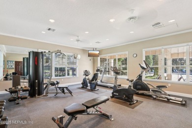 Welcome to this charming ground-level, end unit condo in the