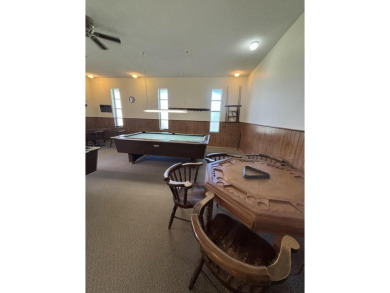 Serene 55+ community of Regal Palms! This third-floor unit