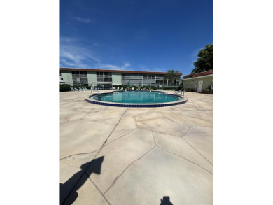 Serene 55+ community of Regal Palms! This third-floor unit