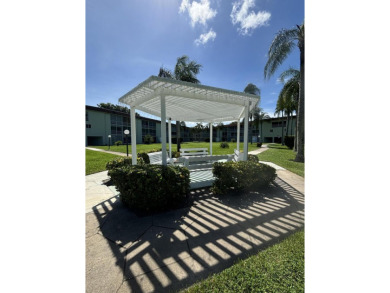 Serene 55+ community of Regal Palms! This third-floor unit