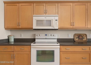 Welcome to Villas at Waterside Unit 100B, a meticulously