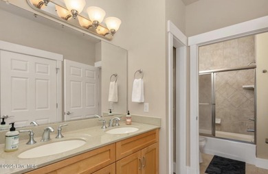 Welcome to Villas at Waterside Unit 100B, a meticulously