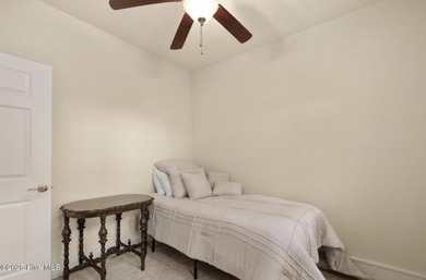 Welcome to Villas at Waterside Unit 100B, a meticulously