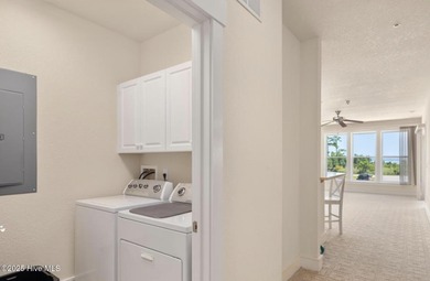 Welcome to Villas at Waterside Unit 100B, a meticulously