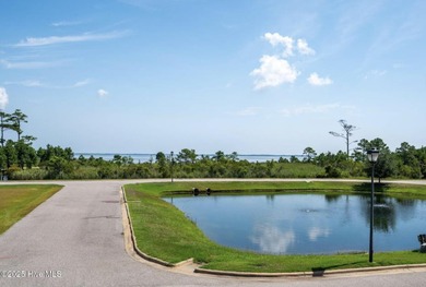 Welcome to Villas at Waterside Unit 100B, a meticulously