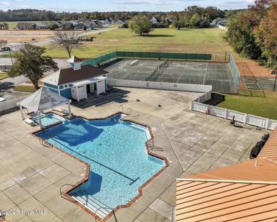 Welcome to Villas at Waterside Unit 100B, a meticulously