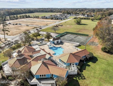 Welcome to Villas at Waterside Unit 100B, a meticulously