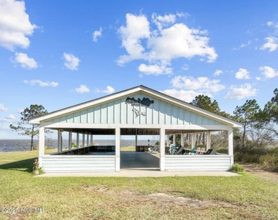 Welcome to Villas at Waterside Unit 100B, a meticulously