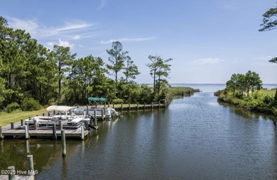 Welcome to Villas at Waterside Unit 100B, a meticulously