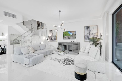 Newer construction-corner 2-story condo w/floor-to-ceiling glass